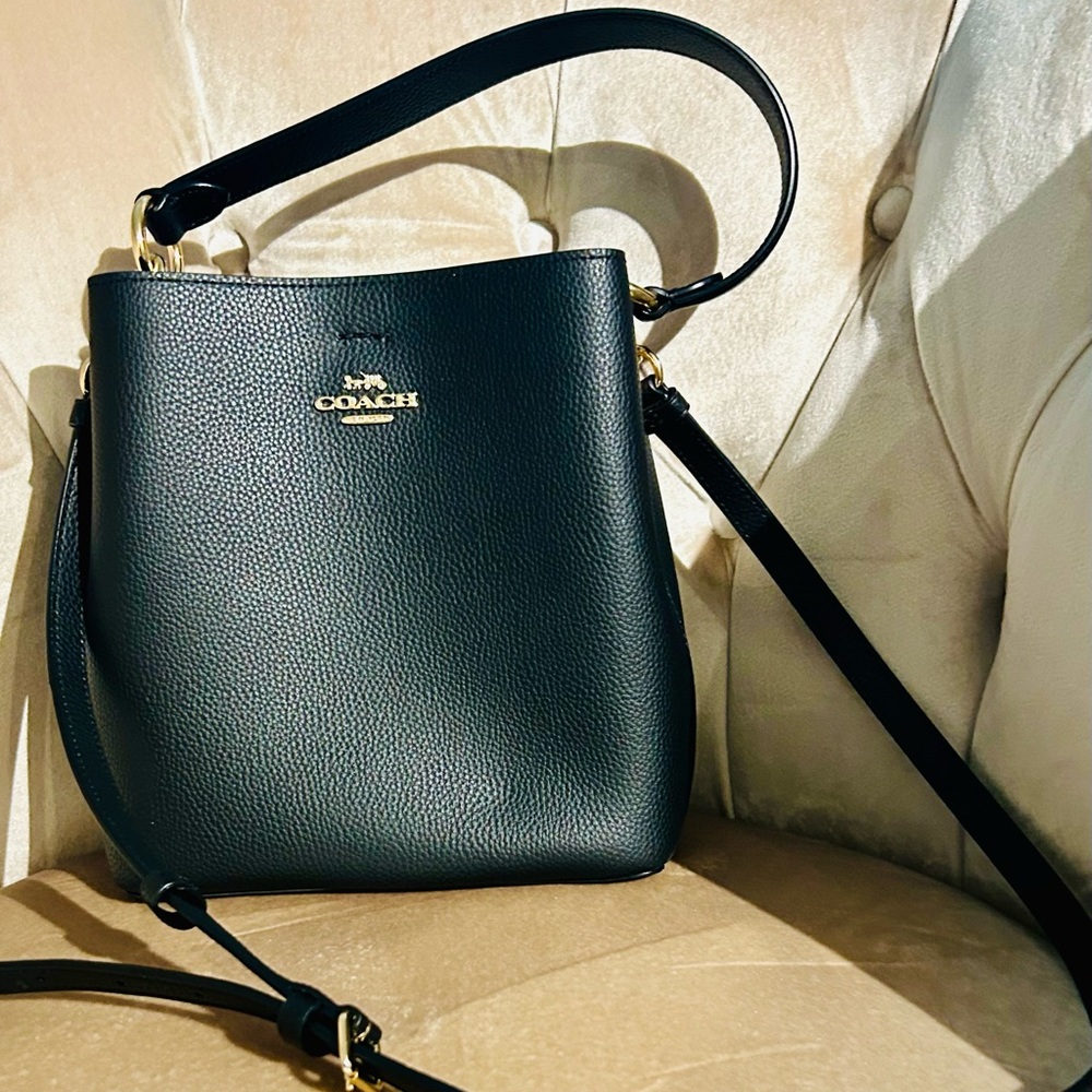 Coach purses. Black